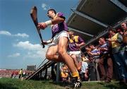 4 August 1996; Wexford Captain Martin Storey leads his team onto the pitch prior to the All-Ireland Senior Hurling Championship Semi-Final match between Wexford and Galway at Croke Park in Dublin. Photo by Brendan Moran/Sportsfile
