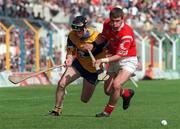 3 May 1998; Diarmuid O'Sullivan of Cork in action against Niall Gilligan of Clare during the National Hurling League Semi-Final match between Cork and Clare at Semple Stadium in Thurles, Tipperary. Photo by Brendan Moran/Sportsfile