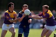 3 May 1998. Action features Niall Sheridan Longford tackled  on his left by Darragh Breen and right Philip Wallace Wexford. Wexford v Longford, Leinster Senior Football Championship. Picture Credit, Matt Browne/ SPORTSFILE.
