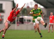 2 May 1998; Noel Kennelly of Kerry in action against Paul Watters of Armagh during the GAA All-Ireland U-21 Football Semi-Final match between Kerry and Armagh at Parnell Park in Dublin. Photo by Brendan Moran/Sportsfile