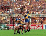 14 September 1997; Ollie Baker of Clare in action against Tommy Dunne of Tipperary during the All Ireland Hurling Final match between Clare and Tipperary at Croke Park in Dublin. Photo by Ray McManus/Sportsfile