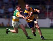 9 August 1998, Ollie Baker of Clare in action against Micheal Duignan of Offaly during the GAA Hurling All-Ireland Senior Championship Semi-Final match between Offaly and Clare at Croke Park in Dublin. Photo by Brendan Moran/Sportsfile