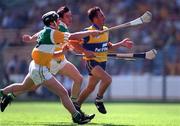 9 August 1998, PJ O'Connell of Clare in action against Hubert rigney, left, and Johnny Pilkington of Offaly during the GAA Hurling All-Ireland Senior Championship Semi-Final match between Offaly and Clare at Croke Park in Dublin. Photo by Ray McManus/Sportsfile