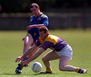 3 May 1998. Action features Paudric Davis Longford has his shot blocked by Ciaran Roche Wexford. Wexford v Longford, Leinster Senior Football Championship. Picture Credit, Matt Browne/ SPORTSFILE.