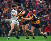 19 July 1998; Paul Flynn of Waterford in action against Frank Lohan, centre, and Brian Quinn of Clare during the Munster GAA Hurling Senior Championship Final Replay match between Clare and Waterford at Semple Stadium in Thurles, Tipperary. Photo by Ray McManus/Sportsfile