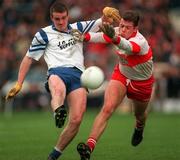 12 April 1998; Pauric McShane of Monaghan in action against Anthony Tohill of Derry during the National Football League Semi-Final match between Derry and Monaghan at Croke Park in Dublin. Photo by Ray McManus/Sportsfile