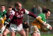 5 April 1998; Peter Brady of Offaly in action against Ray Silke of Galway during the National Football League Quarter-Final match between Galway and Offaly at Dr. Hyde Park in Roscommon. Photo by Matt Browne/Sportsfile