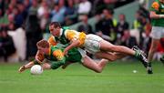 24 May 1998; Barry Malone of Offaly in action against Raymond Magee of Meath during the Leinster GAA Football Senior Championship Quarter-Final match between Meath and Offaly at Croke Park in Dublin. Photo by Ray McManus/Sportsfile