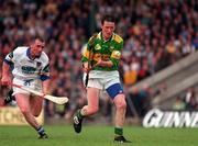 24 May 1998; Richard Gentleman of Kerry in action against Peter Queally of Waterford during the Munster Senior Hurling Championship Quarter-Final match between Kerry and Waterford at Austin Stack Park in Tralee, Co Kerry. Photo by Brendan Moran/Sportsfile