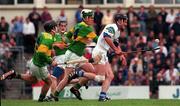 24 May 1998; Sean Culliane of Waterford in action against Ian Maunsell and Mike Slattert, left, of Kerry during the Munster Senior Hurling Championship Quarter-Final match between Kerry and Waterford at Austin Stack Park in Tralee, Co Kerry. Photo by Brendan Moran/Sportsfile