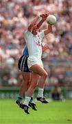 21 June 1998. Kildare's Willie McCreery in a tussle for possession with Dublin's Paul Curran. Leinster Football Championship, Kildare v Dublin, Croke Park, Dublin. Picture Credit: David Maher/SPORTSFILE.