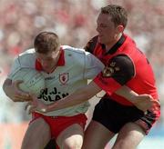 17 May 1998; Stephen Lawn of Tyrone in action against Brian Burns of Down during the Ulster GAA Football Senior Championship Preliminary Round match between Tyrone and Down at St Tiernach's Park in Clones, Monaghan. Photo by David Maher/Sportsfile