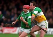 8 March 1998; T.J Ryan of Limerick in action against Kevin Martin of Offaly during the Church & General National Hurling League Division 1A match between Offaly and Limerick at St Brendan's Park in Birr, Offaly. Photo by Matt Browne/Sportsfile
