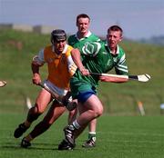 14 June 1998. London's Timmy Maloney in action against Antrim's John Carson. Ulster Hurling Championship, Antrim v London, Casement Park, Belfast. Picture Credit: Damien Eagers/SPORTSFILE.