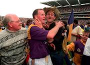 13 July 1997; Wexford's Tom Dempsey is congratulated by fans after their victory following the Leinster Hurling Final match between Wexford and Kilkenny at Croke Park in Dublin. Picture Credit: Brendan Moran/Sportsfile