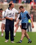 21 June 1998; Dessie Farrell of Dublin is consoled by manager Tommy Carr after being sent off by referee Michael Curly during the Leinster Football Championship at Croke Park in Dublin. Photo by David Maher/Sportsfile