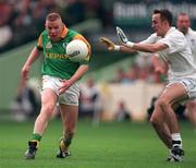 2 August 1998; Tommy Dowd of Meath in action against Brian Lacey of Kildare during the Leinster Senior Football Championship Final match between Kildare and Meath at Croke Park in Dublin. Picture credit: Ray McManus/ Sportsfile