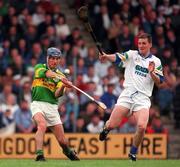 24 May 1998; Willie Joe Leen of Kerry in action against Ken McGrath of Waterford during the Munster Senior Hurling Championship Quarter-Final match between Kerry and Waterford at Austin Stack Park in Tralee, Co Kerry. Photo by Brendan Moran/Sportsfile