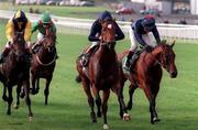 21 September 1997; King of the Kings, with Christy Roche up, centre, leads Celtic Cavalier, with MJ Kinane up, right, and Mountain Song, with Seb Saunders up, left, on their way to winning the Aga Khan Studs National Stakes at The Curragh Racecourse in Kildare. Photo by Sportsfile