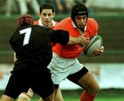 26 September 1998: Alan Quinlan of Munster is tackled by Brett Sinkinson of Neath during the  Heineken Cup Pool B Round 2 match between Munster and Neath at Musgrave Park in Cork. Photo by Matt Browne/Sportsfile