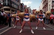 22 July 1997; Members of the Crown Jewels Cheerleaders, from left, Lisa Burston, Kerry Jenkins and Natasha Merogno who were in Grafton Street today to promote the Budweiser American Bowl which takes place in Croke Park on Sunday. Photo by Ray McManus/Sportsfile