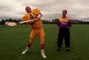 23 July 1997; Pittsburgh Steelers Defensive Tackle Frank Messmer demonstrates his hurling skills to Wexford hurler Tom Dempsey at a photo call at UCD in Belfield, Dublin, ahead of the Budweiser American Bowl. Photo by David Maher/Sportsfile