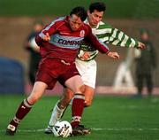 10 December 2000; Bobby Ryan of Galway United is tackled by Brian Byrne of Shamrock Rovers during the Eircom League Premier Division match between Shamrock Rovers and Galway United at Morton Stadium in Dublin. Photo by Ray Lohan/Sportsfile