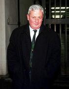 27 November 2000;  FAI Honorary Treasurer Brendan Menton leaves by the rear entrance following the FAI National Council Meeting at FAI Headquarters in Merrion Square, Dublin. Photo by David Maher/Sportsfile