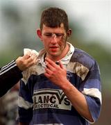 29 April 2000; Brian Toland of Old Cresent gets a helping hand after receiving an injury during the AIB All-Ireland League Division 2 match between Blackrock College and Old Crescent at Stradbrook Road in Dublin. Photo by Ray McManus/Sportsfile