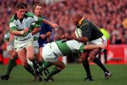 19 November 2000; Chester Williams of South Africa is tackled by Denis Hickie of Ireland during the International Rugby Friendly match between Ireland and South Africa at Lansdowne Road in Dublin. Photo by  Aoife Rice/Sportsfile