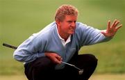 6 July 1996; Colin Montgomerie asks the crowd to stop taking pictures on the first green during the third round of the Murphy's Irish Open Golf Championship at Druid's Glen in Wicklow. Photo by Ray McManus/Sportsfile