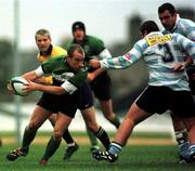 7 November 1998; Conor McGuinness of Connacht is held back by Andre Vigna of Racing Club during the  European Shield match between Connacht and Racing Club at the Sportsground in Galway. Photo by Brendan Moran/Sportsfile