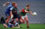 1 October 2000; Cora Staunton of Mayo is tackeled by Marion Troy and Olivia Condon of Waterford during the TG4 All-Ireland Senior Ladies Football Championship Final between Mayo and Waterford at Croke Park in Dublin. Photo by Ray McManus/Sportsfile