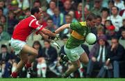 18 July 1996; Dara O'Cinneide of Kerry in action against Mark O'Connor of Cork during the Bank of Ireland Munster Senior Football Championship Final match between Cork and Kerry at Pairc Ui Chaoimh in Cork. Photo by Ray McManus/Sportsfile