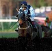 27 December 2000; Folly Road, with Tom Rudd up, jumps the last, first time round, during the paddypower.com Handicap Steeplechase on Day Two of the Leopardstown Christmas Festival at Leopardstown Racecourse in Dublin. Photo by Matt Browne/Sportsfile