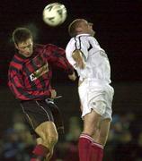 6 January 2001; Wes Byrne of Longford Town in action against James Mulligan of Cork City during the FAI Harp Lager Cup Second Round match between Longford Town and Cork City at Flancare Park in Longford. Photo by David Maher/Sportsfile
