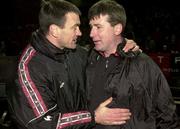 6 January 2001; Cork City manager Derek Mountfield and Longford Town manager Stephen Kenny embrace following the FAI Harp Lager Cup Second Round match between Longford Town and Cork City at Flancare Park in Longford. Photo by David Maher/Sportsfile