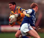 3 December 2000; Ian Foley of Na Fianna in action against Barry English of O'Hanrahans during the AIB Leinster Club Football Championship Final match between O'Hanrahans and Na Fianna at O'Moore Park in Portlaoise, Laois. Photo by David Maher/Sportsfile
