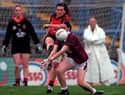 1 October 2000; Jacqui Clarke of Down is tackled by Emma Curley of Galway during the All-Ireland Ladies Junior Football Final match between Down and Galway at Croke Park in Dublin. Photo by Ray McManus/Sportsfile