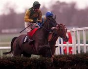 31 December 2000; Glens Music, with Tom Treacy up, jumps the last on their way to finishing second in the O'Dwyers Stillorgan Orchard Novice Hurdle on day three of the Leopardstown Christmas Festival at Leopardstown Racecourse in Dublin. Photo by Aoife Rice/Sportsfile