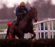 31 December 2000; Ardentium, with Charlie Swan up, jumps the last on their way to finishing fifth in the O'Dwyers Stillorgan Orchard Novice Hurdle on day three of the Leopardstown Christmas Festival at Leopardstown Racecourse in Dublin. Photo by Aoife Rice/Sportsfile