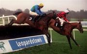 31 December 2000; Over The Furze, with Conor O'Dwyer up, right, jumps the last first time round ahead of Artic Copper, with Ruby Walsh up, on their way to winning the O'Dwyers Stillorgan Orchard Novice Hurdle on day three of the Leopardstown Christmas Festival at Leopardstown Racecourse in Dublin. Photo by Ray Lohan/Sportsfile