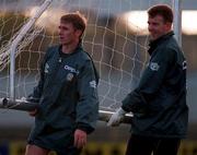 7 November 1996; David Kelly, left, and Alan Kelly carry the goalposts during a Republic of Ireland training session at Oriel Park in Dundalk. Photo by David Maher/Sportsfile