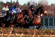 27 December 2000; Lisaan, with Barry Cash up, left, and Bodakker, with Mark Sullivan up, during the paddypower.com Festival 3-Y-O Hurdle on Day Two of the Leopardstown Christmas Festival at Leopardstown Racecourse in Dublin. Photo by Matt Browne/Sportsfile