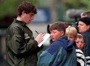 28 may 1996; Mark Kennedy signs autographs after a Republic of Ireland training session at Lansdowne Road in Dublin. Photo by David Maher/Sportsfile