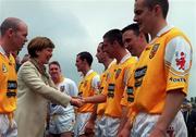 2 July 2000; Uachtarán Chumann Lúthchleas Gael Mary McAllese greets the Antrim team prior to the  Bank of Ireland Ulster Senior Football Championship Semi-Final Replay match between Antrim and Derry at Casement Park in Belfast. Photo by Aoife Rice/Sportsfile