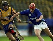 26 November 2000; Michael White of Mount Sion in action against John O'Connell of Sixmilebridge during the AIB Munster Senior Hurling Club Championship Final match between Sixmilebridge and  Mount Sion at Semple Stadium in Thurles. Photo by Brendan Moran/Sportsfile