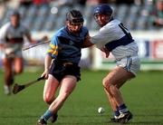 8 October 2000; Mick Gordon of UCD in action against Paddy Brady of St Vincent's during the Dublin Senior Hurling A Championship Final match between UCD and St Vincent's at Parnell Park in Dublin. Photo by Ray Lohan/Sportsfile