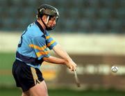 8 October 2000; Mick Gordon of UCD shoots to score his side's first goa during the Dublin Senior Hurling A Championship Final match between UCD and St Vincent's at Parnell Park in Dublin. Photo by Ray Lohan/Sportsfile
