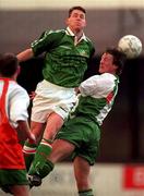 March 1996; Mick O'Byrne of National League in action against Wesley Byrne of Republic of Ireland Under-21's during a Friendly match between National League XI and Republic of Ireland Under-21's at Richmond Park in Dublin. Photo by Brendan Moran/Sportsfile